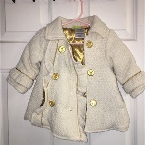 cream and gold winter coat